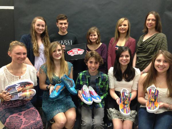Souths+shoe+designers+proudly+display+their+artwork.