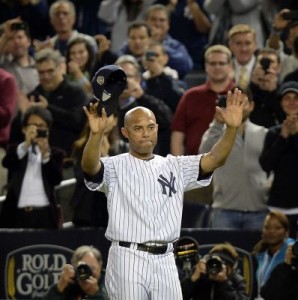 Rivera salutes his home stadium crowd on his final night at the stadium.