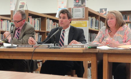 Dr. William George, Superintendent of Schools, at the Board of Education Meeting