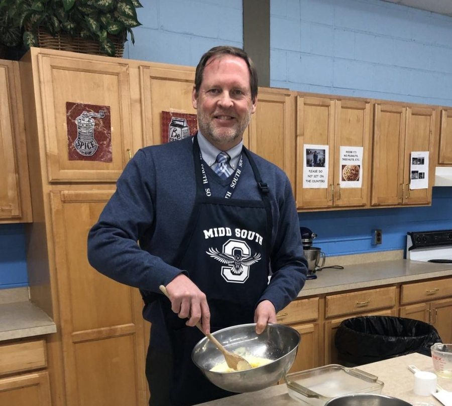 Mr. Olausen Cooks With Culinary Arts Students